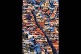 Aerial view of Main street in winter with snow in Göcklingen in the state Rhineland-Palatinate, Germany