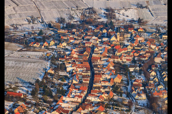 Wine-growing village from the west in winter with snow in Göcklingen in the state Rhineland-Palatinate, Germany