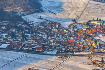 Wine village from the southeast in winter with snow in Eschbach in the state Rhineland-Palatinate, Germany