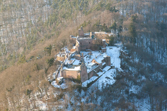 Aerial photograpy of Wintry snowy Ruins and vestiges of the former castle and fortress Burgruine Madenburg in Eschbach in the state Rhineland-Palatinate