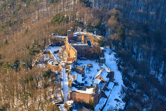 Oblique view of Madenburg castle ruins in winter with snow in Eschbach in the state Rhineland-Palatinate, Germany