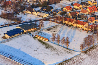 Oblique view of Dierbachhalle and sports fields in winter when there is snow in Dierbach in the state Rhineland-Palatinate, Germany