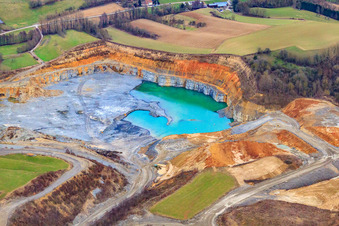 Aerial view of Nussloch quarry with blue water in Nußloch in the state Baden-Wuerttemberg, Germany