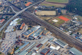 Industrial area with KYOCERA Fineceramics Europe GmbH and Aliaxis Deutschland GmbH opposite the sports fields of TV 1892 Friedrichsfeld, Riding and Driving Club Mannheim- Friedrichsfeld eV and FC Germania in the district Friedrichsfeld in Mannheim in the state Baden-Wuerttemberg, Germany
