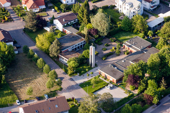 Aerial view of Church building of the Evangelic community with Kindergarden One World in Wiesloch in the state Baden-Wurttemberg, Germany