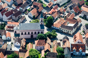 Church and Inn Karpfen in Neupotz in the state Rhineland-Palatinate, Germany
