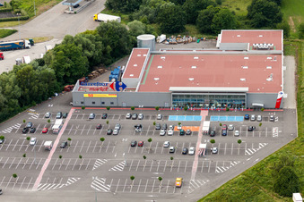 Aerial view of Store of the Supermarket Carrefour Market Lauterbourg in Scheibenhard in Grand Est, France
