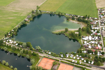 Aerial view of Camping with caravans and tents at the lake in the district Beinheim in Seltz in Grand Est, France