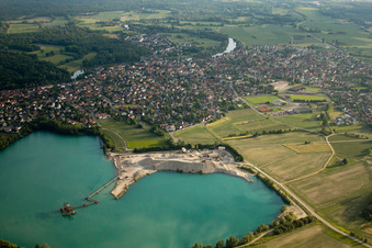 Aerial view of Terrain and overburden areas of the Gravière open-cast gravel mine at the quarry lake in La Wantzenau in the state Bas-Rhin, France
