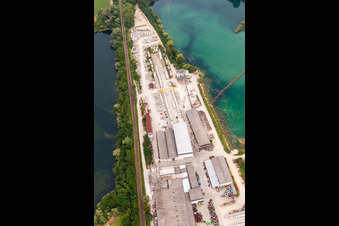 Mixed concrete parts factory at a lake in the district Rheinsheim in Philippsburg in the state Baden-Wurttemberg, Germany