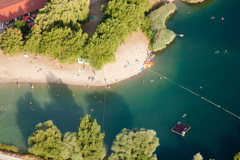 Aerial photograpy of Camping with caravans and tents at a lake with beach in Gambsheim in Grand Est, France