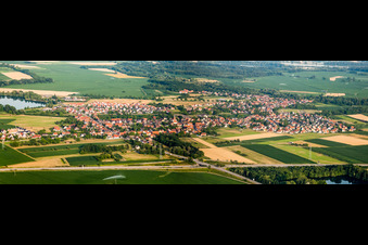 Panoramic perspective Village - view on the edge of agricultural fields and farmland in Rountzenheim in Grand Est, France