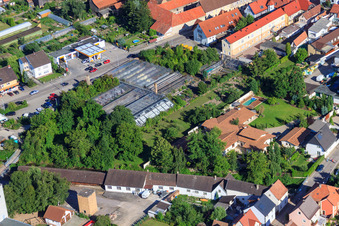 Greenhouses on Lindenstr in Rülzheim in the state Rhineland-Palatinate, Germany from the plane
