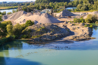 Gravel plant of Heidelberg Materials on the Altrhein at Neupotz in Neupotz in the state Rhineland-Palatinate, Germany