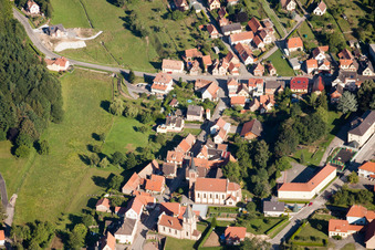 Aerial view of Two Church buildings in the village of in Climbach in Grand Est, France