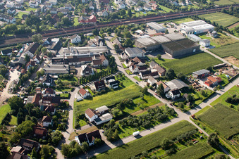 Building and production halls on the premises of Muffenrohr GmbH in Ottersweier in the state Baden-Wurttemberg from the drone perspective