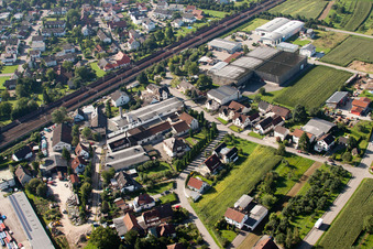 Building and production halls on the premises of Muffenrohr GmbH in Ottersweier in the state Baden-Wurttemberg from a drone