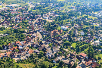 Town center from the northwest with St. John's Church in the district Weier in Ottersweier in the state Baden-Wuerttemberg, Germany