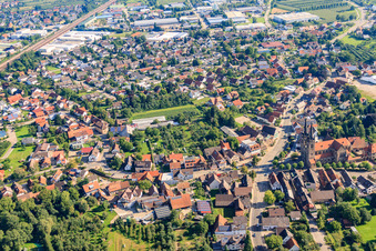 Eisenbahnstraße Hauptstraße with St. John's Church in the district Weier in Ottersweier in the state Baden-Wuerttemberg, Germany