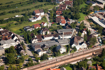 Building and production halls on the premises of Muffenrohr GmbH in Ottersweier in the state Baden-Wurttemberg seen from above