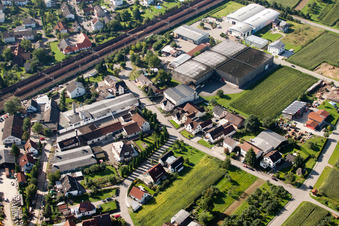 Building and production halls on the premises of Muffenrohr GmbH in Ottersweier in the state Baden-Wurttemberg seen from a drone