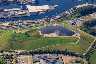 Garbage mountain with wind turbines in the district Knielingen in Karlsruhe in the state Baden-Wuerttemberg, Germany