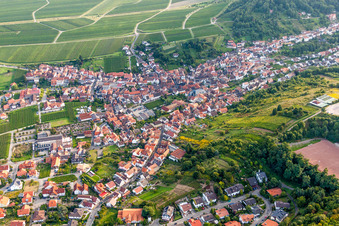 Oblique view of Village - view on the edge of agricultural fields and farmland in Sankt Martin in the state Rhineland-Palatinate, Germany
