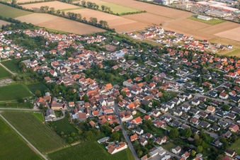 Village - view on the edge of agricultural fields and farmland in Bornheim in the state Rhineland-Palatinate