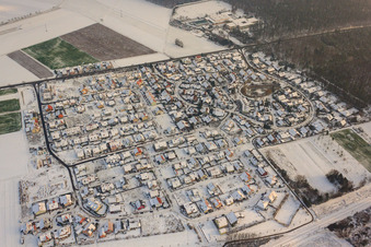 New development area at the clay pits in winter with snow in Rheinzabern in the state Rhineland-Palatinate, Germany