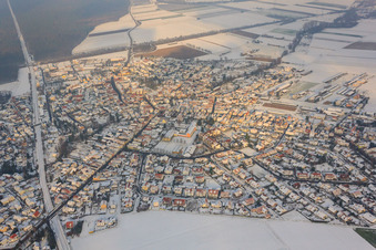 View of the town from the southwest in winter with snow in Rheinzabern in the state Rhineland-Palatinate, Germany