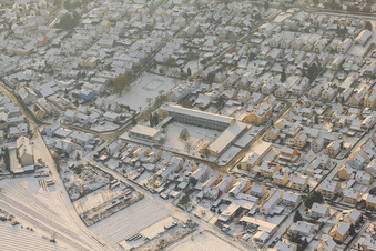 Aerial view of Lina Sommer Elementary School in winter with snow in Jockgrim in the state Rhineland-Palatinate, Germany
