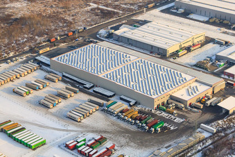 Aerial view of NUSS Group in the Oberwald industrial area in winter with snow in Wörth am Rhein in the state Rhineland-Palatinate, Germany