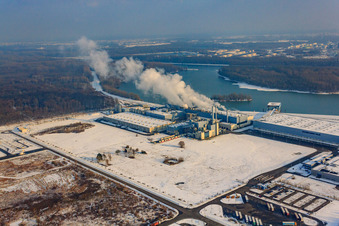 Palm paper mill in the Oberwald industrial area in winter with snow in Wörth am Rhein in the state Rhineland-Palatinate, Germany