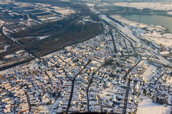 Bahnhofstraße in winter with snow in Wörth am Rhein in the state Rhineland-Palatinate, Germany