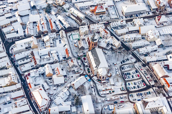 Aerial view of St. George's Church in winter with snow in Kandel in the state Rhineland-Palatinate, Germany