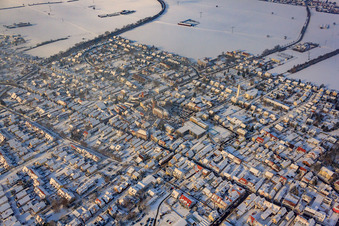Aerial photograpy of Christmas market at Plätzl and around St. George's Church in snow in Kandel in the state Rhineland-Palatinate, Germany