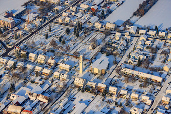 Catholic Church of St. Pius, cemetery in winter with snow in Kandel in the state Rhineland-Palatinate, Germany