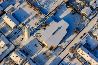 Aerial view of Catholic Church of St. Pius in winter with snow in Kandel in the state Rhineland-Palatinate, Germany