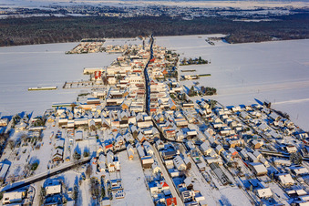 Village view in winter/snow in the district Hayna in Herxheim bei Landau in the state Rhineland-Palatinate, Germany