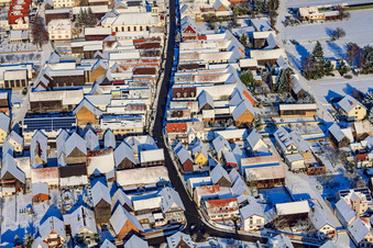 Main Street in Winter/Snow in the district Hayna in Herxheim bei Landau in the state Rhineland-Palatinate, Germany