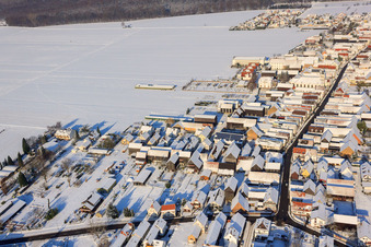 Aerial photograpy of Main Street in Winter/Snow in the district Hayna in Herxheim bei Landau in the state Rhineland-Palatinate, Germany