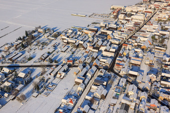 Main Street in Winter/Snow in the district Hayna in Herxheim bei Landau in the state Rhineland-Palatinate, Germany from above