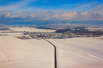 View of the town in winter with snow from the east in Steinweiler in the state Rhineland-Palatinate, Germany