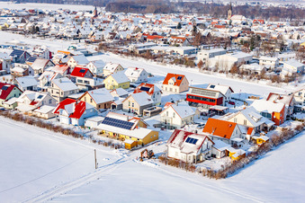 Oblique view of New development area Brotäcker in winter with snow in Steinweiler in the state Rhineland-Palatinate, Germany