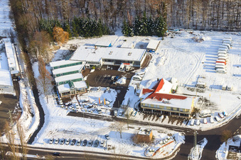Aerial view of Auto Bohlender GmbH & Co.KG Auto Bohlender GmbH & Co.KG in snow in winter in Kandel in the state Rhineland-Palatinate, Germany