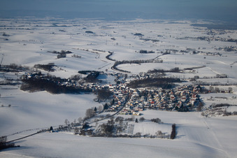 Aerial view of In winter when there is snow in Neewiller-près-Lauterbourg in the state Bas-Rhin, France