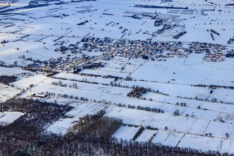 Village view from the south in snow in winter in Kapsweyer in the state Rhineland-Palatinate, Germany