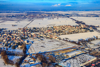 New development area on the Höchst under development during snow in winter in Rohrbach in the state Rhineland-Palatinate, Germany