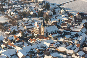 Wintry snowy Church building in of Evangelischen Kirche Old Town- center of downtown in the district Moerzheim in Landau in der Pfalz in the state Rhineland-Palatinate, Germany
