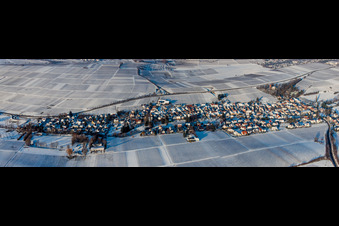 Panorama of winter snow-covered agricultural fields and farmland in the district Wollmesheim in Landau in der Pfalz in the state Rhineland-Palatinate, Germany